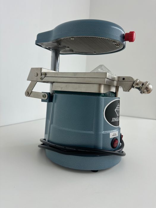 Máquina de moldagem a vácuo dentária