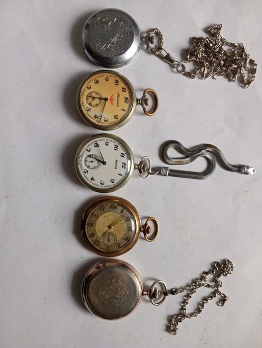 Годинники настінні - карманні -  le roi a Paris