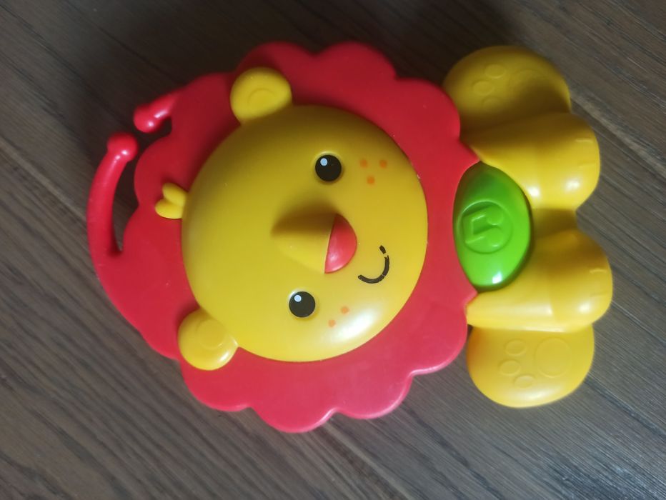Grający lew fisher price