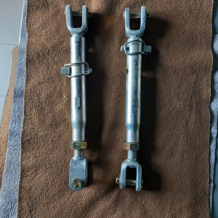 Бокові стяжки трактора донг фенг 244.