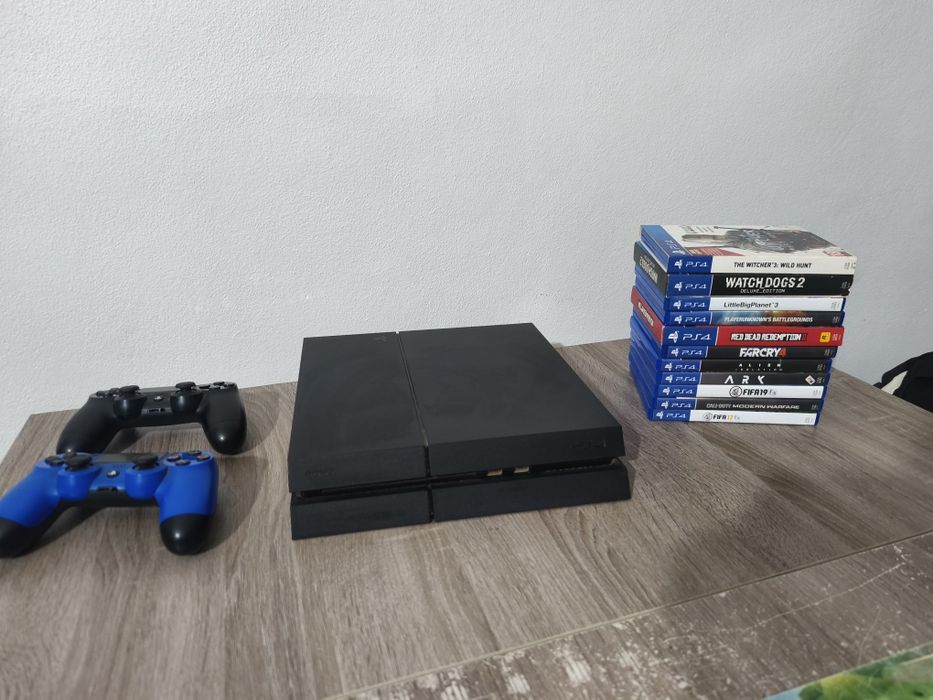 PlayStation 4 + 2 comandos + 11 jogos