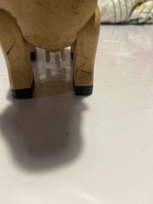 Vaquinha mais filhote de madeira