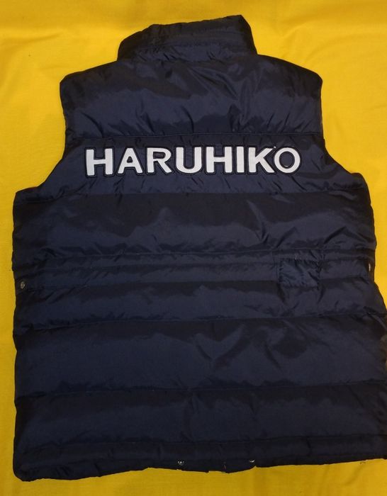 Тепла безрукавка пуховик на хлопчика 8-10 років