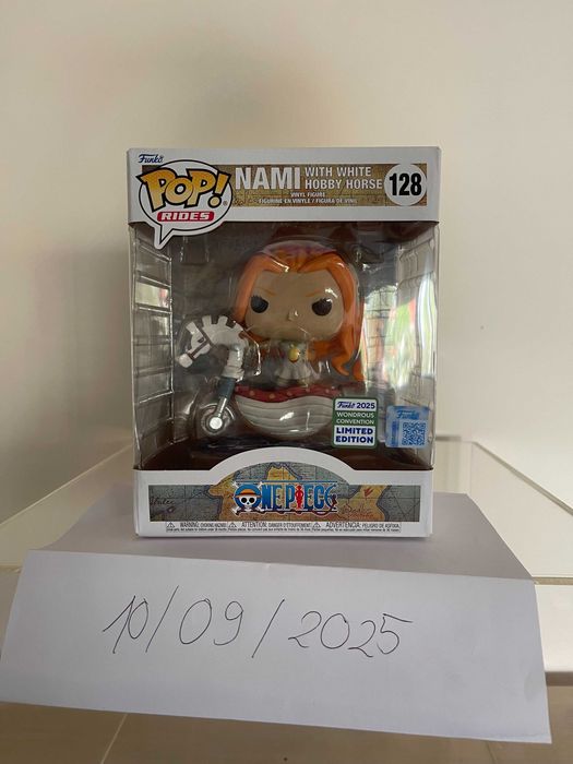 #128 - Funko Pop! One Piece - Nami with Hobby Horse (2025 Wondrous Con64738279757697120