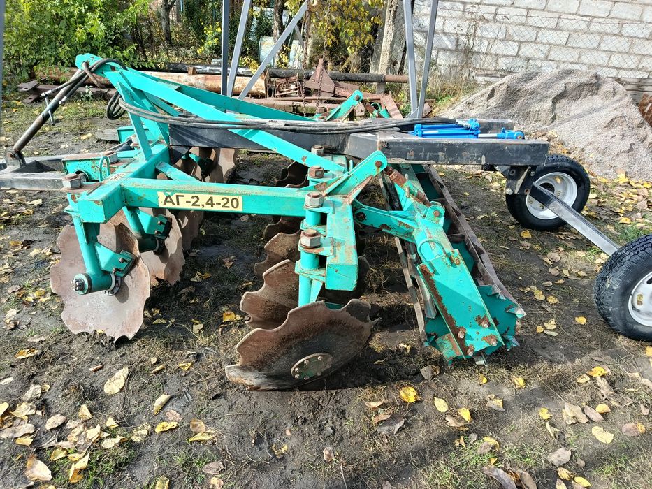 Причіпний пристрій для дискової борони