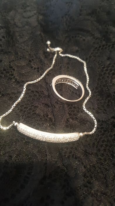 Anel prata e pulseira ...