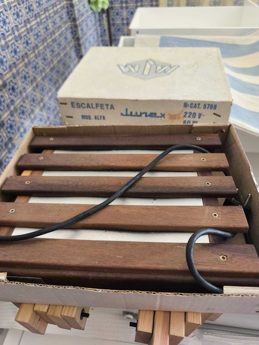 Aquecedor de pés, escalfeta