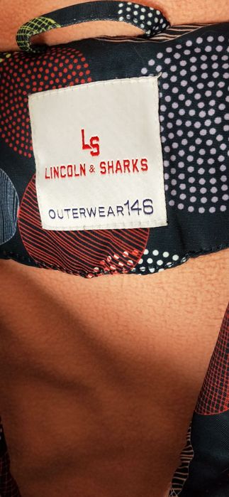 Зимова фірмова куртка на дівчинку