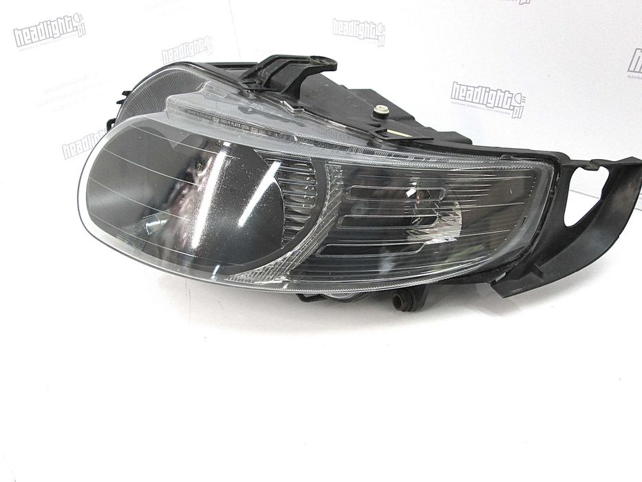 SAAB 9-5 95 lampa  lewa Xenon Europa