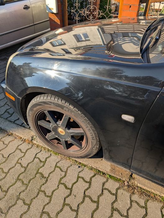 Czarny Cadillac Sts 3.6 benzyna gaz lpg europa