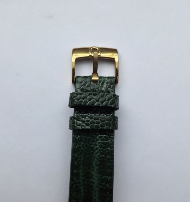 Золотий швейцарскій годинник Omega