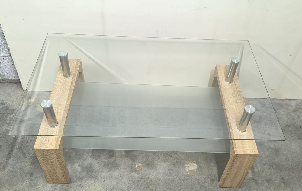 Belíssima mesa de centro Missouri Cambrian, pé em madeira e vidro.
Ler