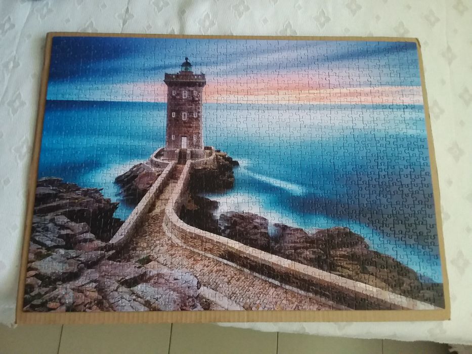 Caixa com 3 Puzzles de 1000 peças