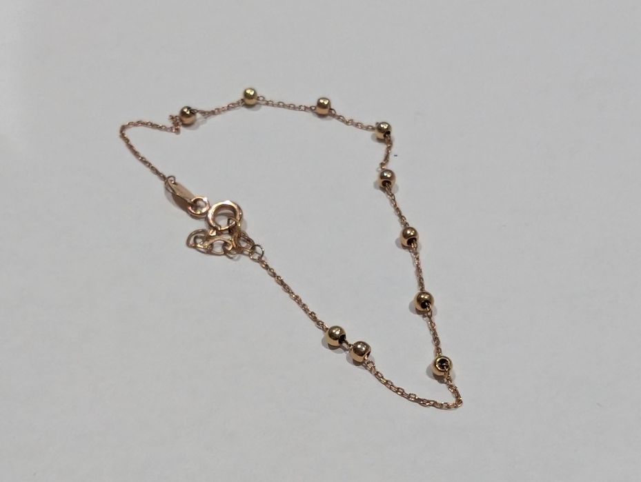 Золотий браслет з алмазними кульками 585