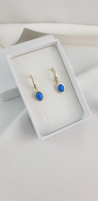 Złote wiszące kolczyki z  niebieskim opalem 585 nowe Zapięcie angielsk