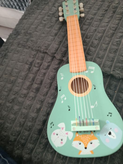 Nauczyciel gry na gitarze