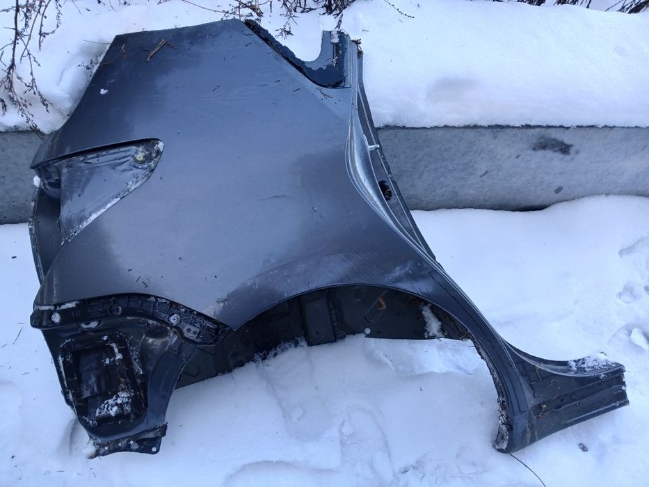 Blotnik tylny prawy cwiatka prawa TOYOTA VERSO 09-18