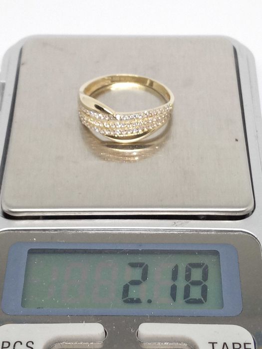 Lombardowski. W.Kruk Złoty pierścionek pr.585 2,18g rozm.19 BDB stan