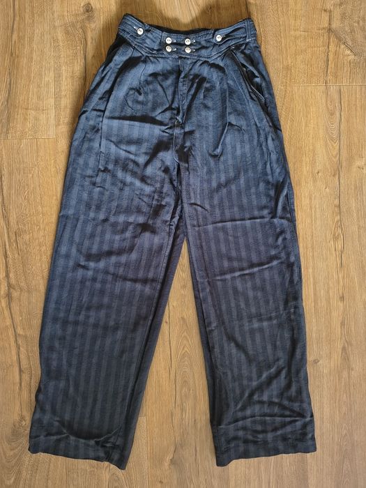 Stylowe spodnie retro z wysokim stanem i szerokimi nogawkami (Wide Leg)