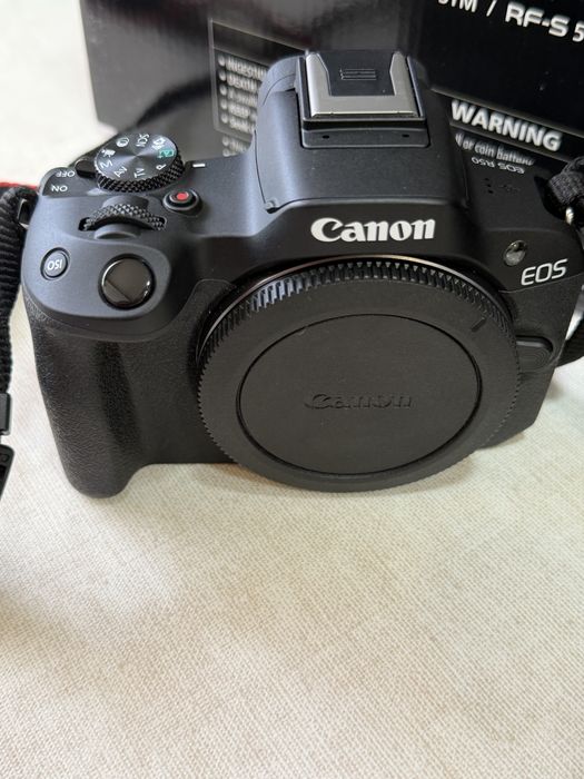 Canon R50 + objetiva 18-45mm + objetiva 55-210 + carregador