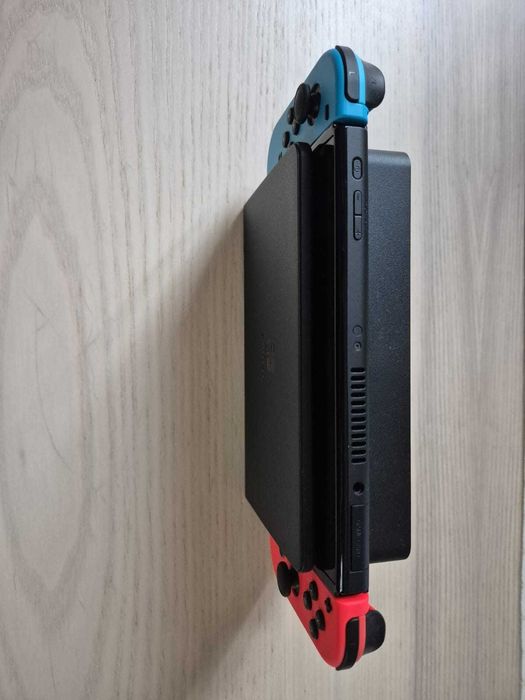 Nintendo Switch OLED + Bolsa de Transporte + Jogo "Hogwarts Legacy"