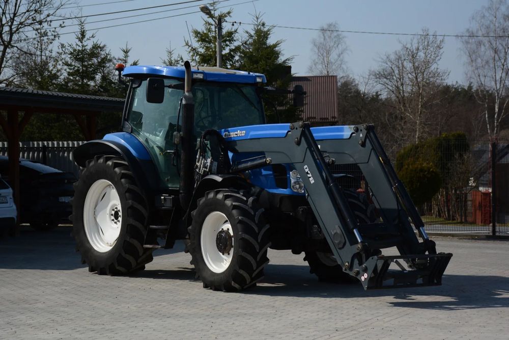 New Holland TSA.135 / 2004r. / Ładowacz czołowy / Tuz / Klima / Super stan  New Holland TSA.135 / 2004r. / Ładowacz czołowy / Tuz / Klima