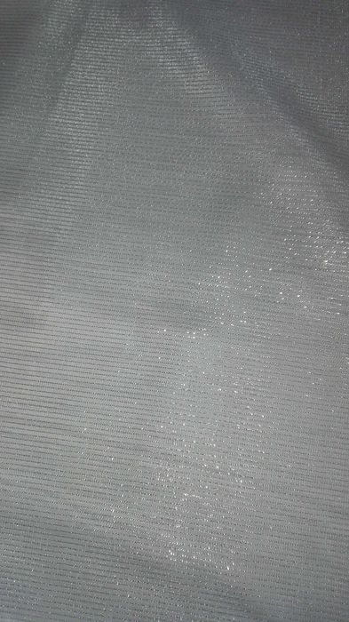 firanka w kolorze błękitu z metalizowaną nitką