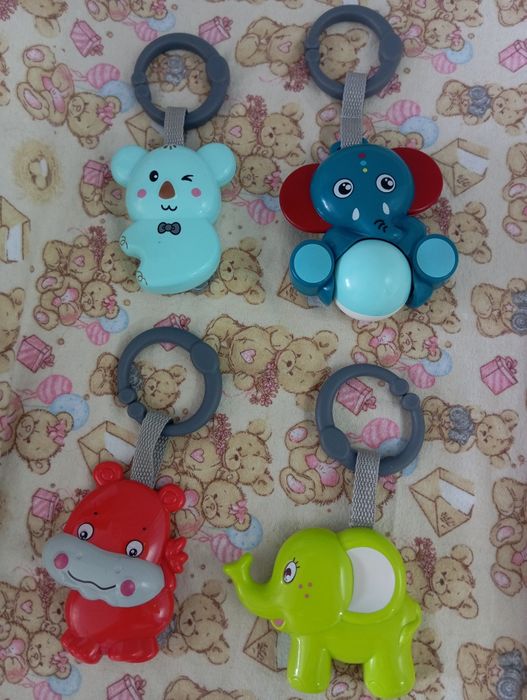 Погремушки на коляску,кроватку