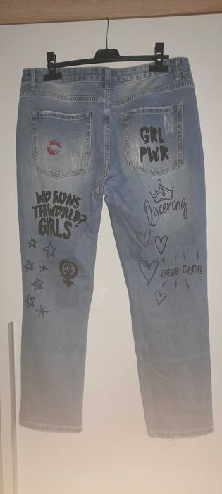 Spodnie jeansy damskie dziury xl 42
