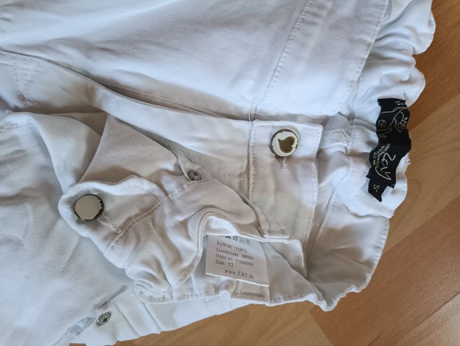 Białe spodnie damskie 52