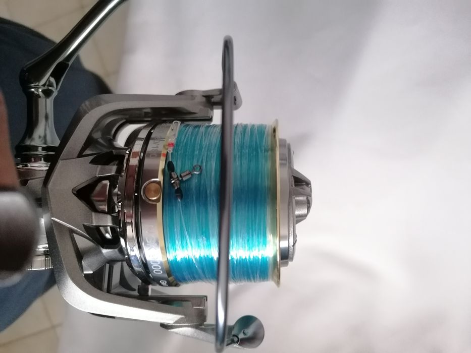 Carreto pesca novo com linha daiwa