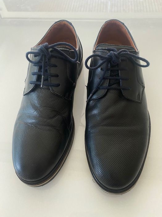 Calçado clássico de homem