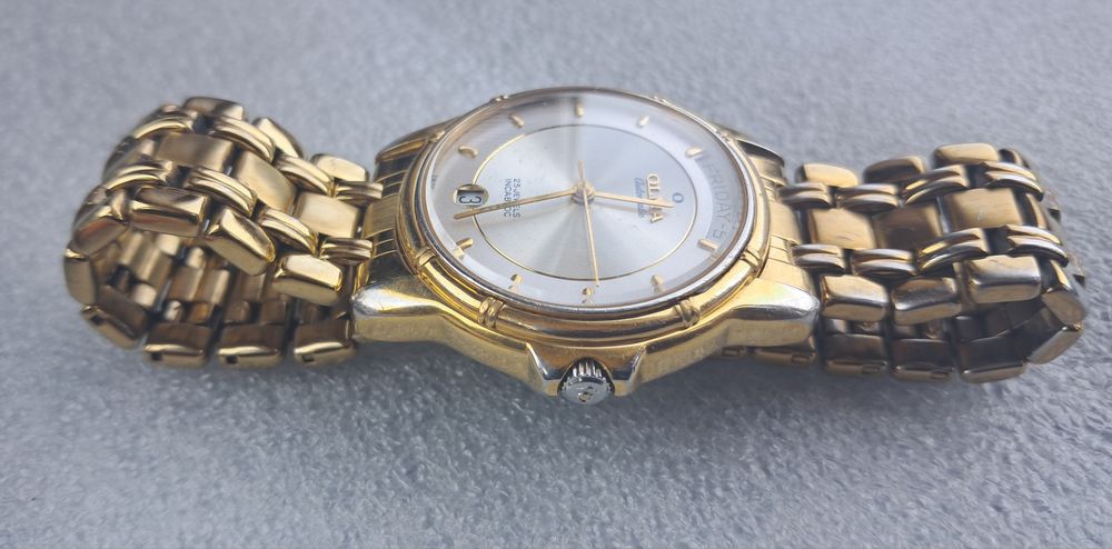 Часы OLMA automatic.