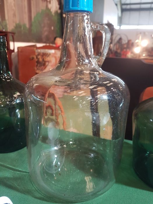 Garrafões em vidro