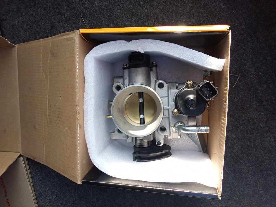 Дроссель Митсубиси Лансер 9