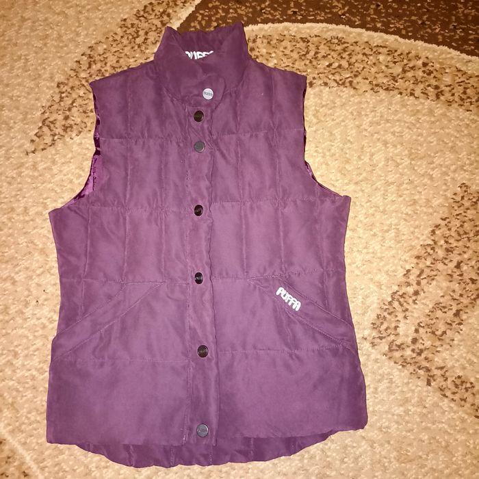 Тепла стьобана жилетка