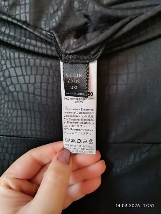 Czarne legginsy zwierzęcy wzór r 48 50