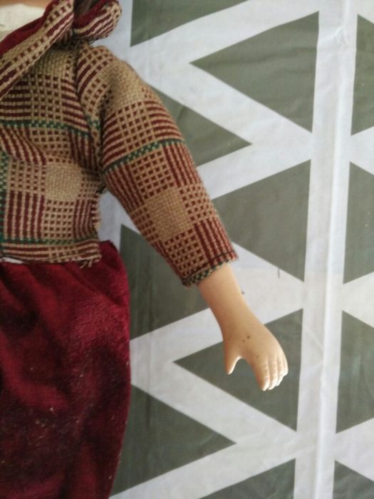 Boneco de porcelana antiga