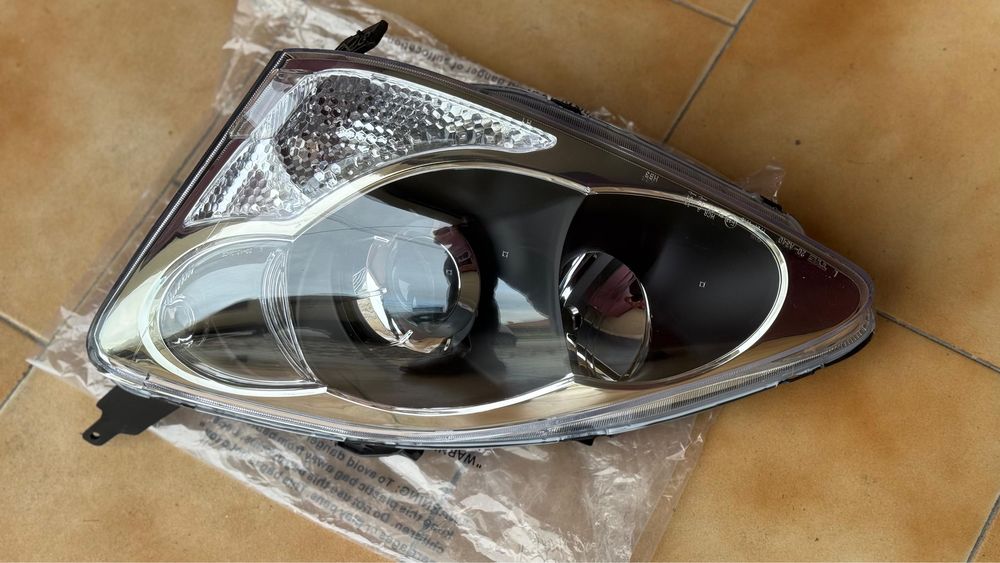 Farol Honda Civic 7
