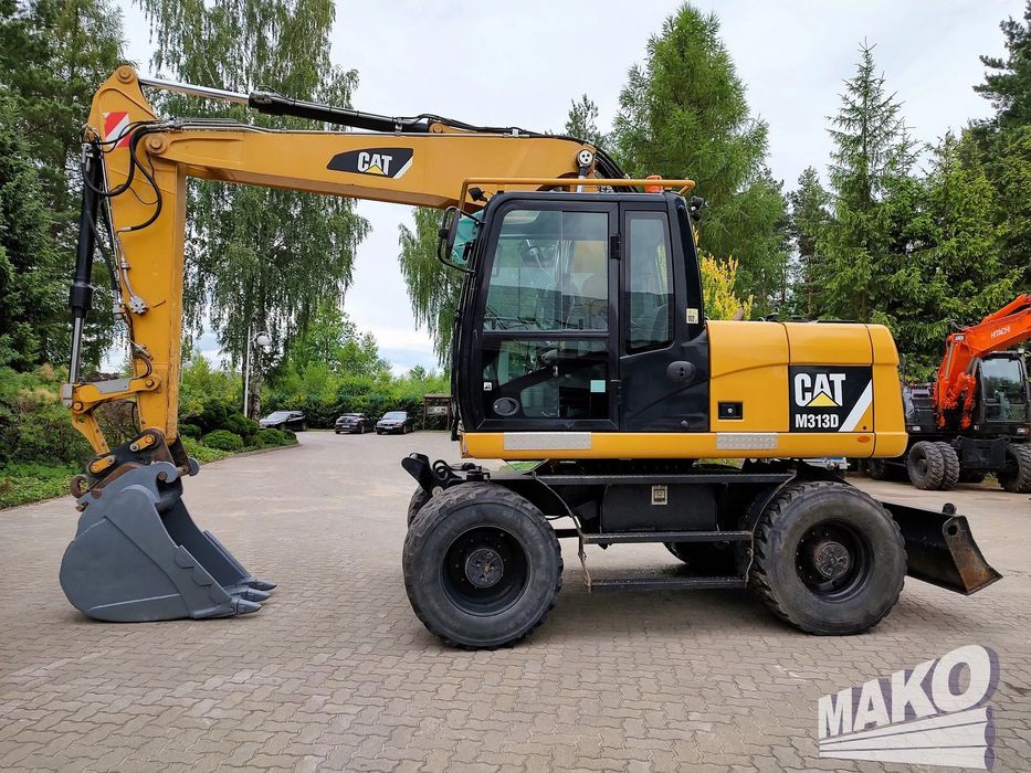 Caterpillar M313D  Verachtert / 8275 mth / Pług