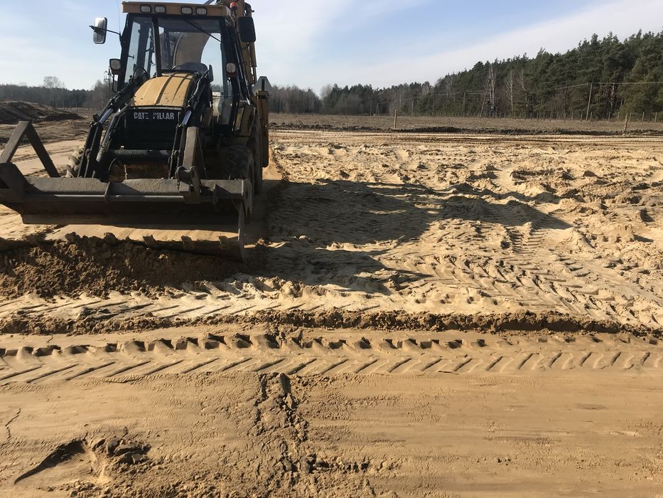 Usługi koparko-ładowarką budowlane koparką kołową transport