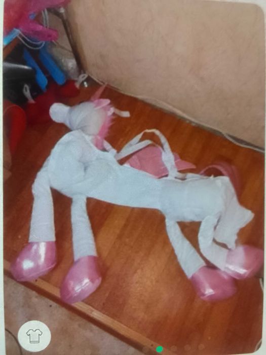 мягкий Единорог ,а ребенок всадник