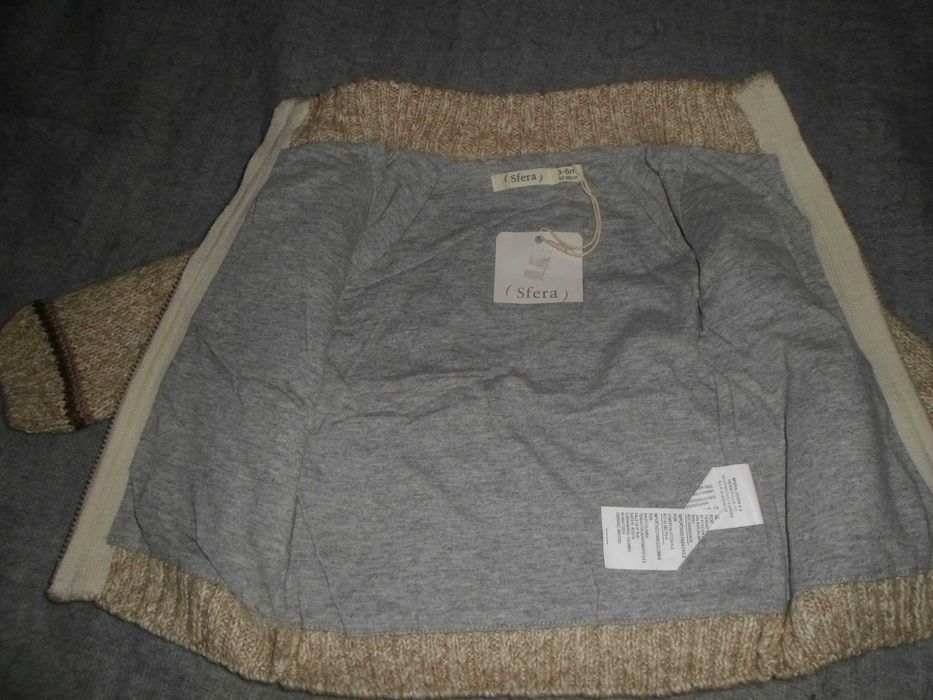 casaquinho novo com etiqueta para bebés