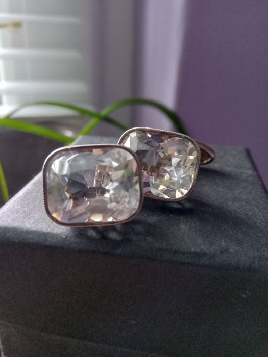 Серебряные запонки.
