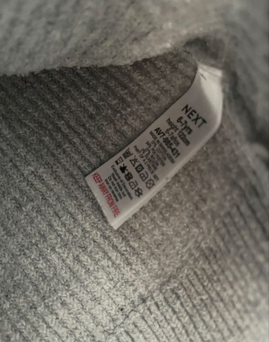 Sweter next dalmatyńczyk