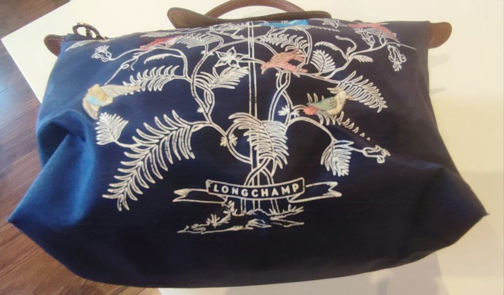 Oryginalna Torebka Longchamp.Kolor granatowy z elementami ze skóry