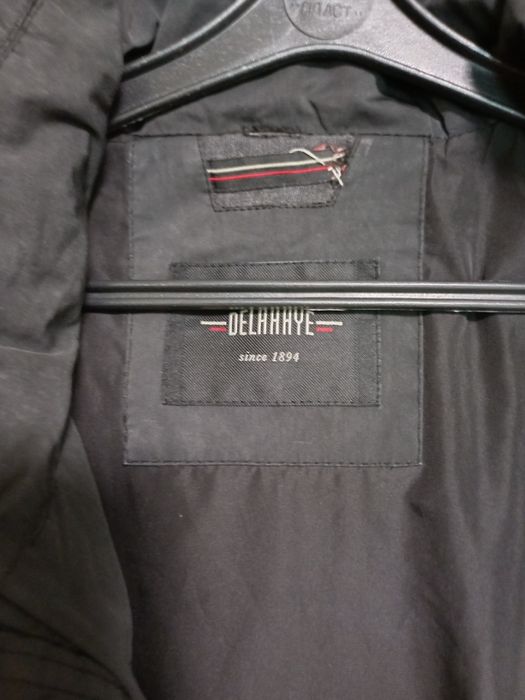 Теплий пуховик з капюшоном