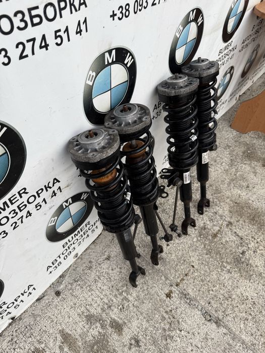 Бмв ф10 амортизатор