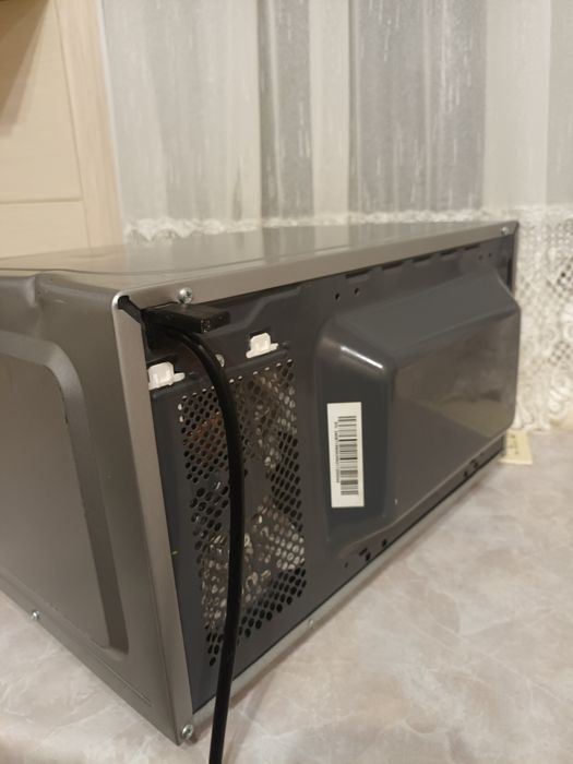 Мікрохвильова піч Sharp R 242 та Nord