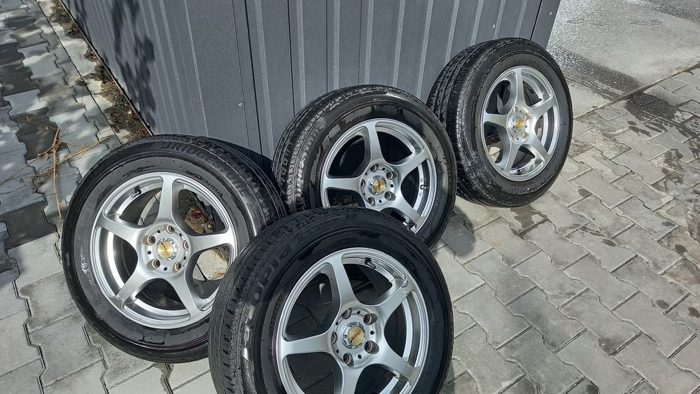 Продам резину Bdgestone летнюю с дисками 195/65/R15, 5 на 115
